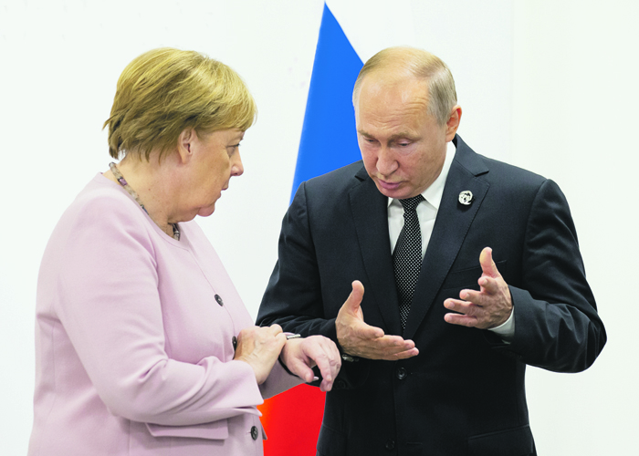 Три пункта требований Меркель против одного пункта Путина 